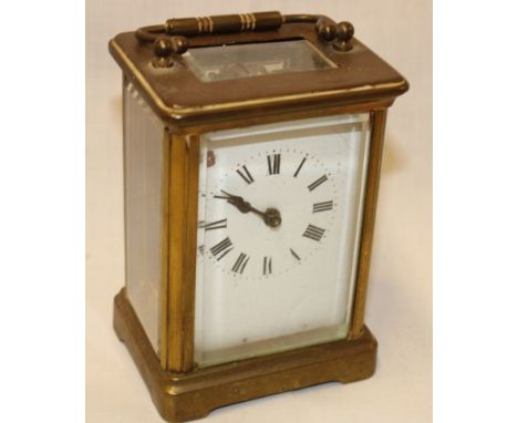 A French carriage clock with rectangular enamelled dial in brass traditional case (af) 