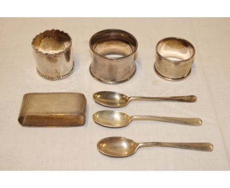 A silver oval napkin ring with engine turned decoration, Chester marks, three other various silver napkin rings, spoons etc 