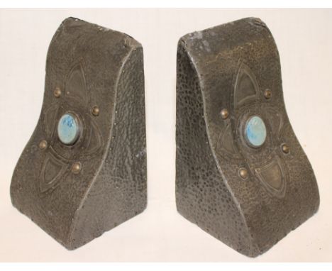A pair of Art Nouveau pewter mounted angular bookends mounted with a turquoise ceramic cabochon, 6" high 