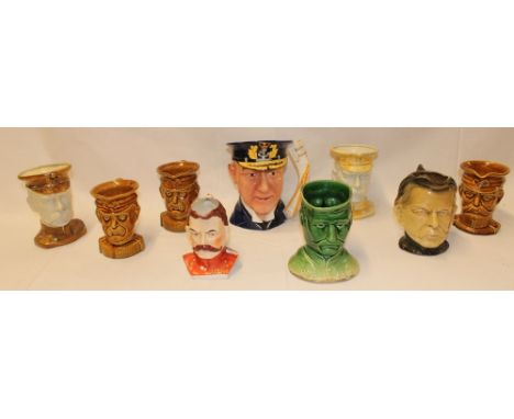  A selection of Military-related pottery character jugs including Boer War "Our Army / Our Navy" double sided character jug; 