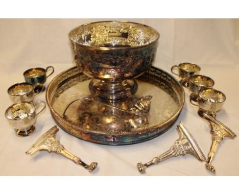 A silver-plated pedestal punch bowl with six glasses and ladle, large silver-plated circular tray etc