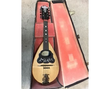 A cased Gav Giovanni De Meglio E Figlio Neapolitan mandolin dated 1898. Approximately 60cm long Postage category C