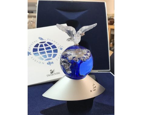 A boxed Swarovski Planet Vision 2000 figure of the globe surmounted by a Dove carrying an Olive Branch, with Certificate