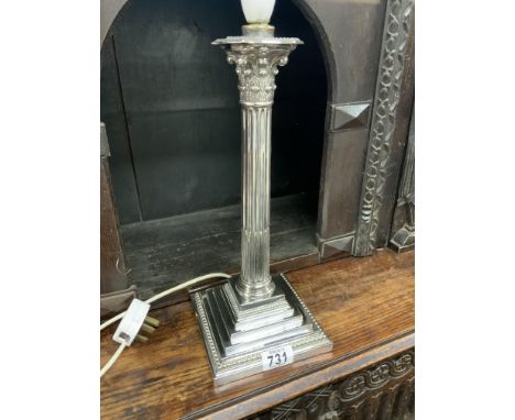 A large Silver plated Corinthian column candlestick, 36cm.