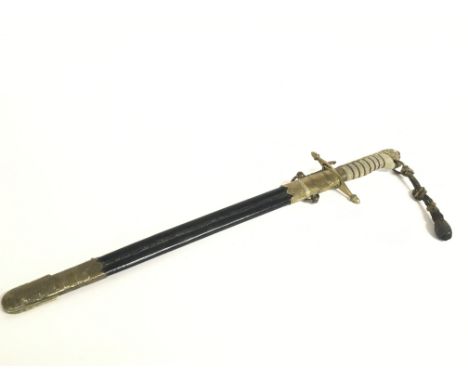 A 20th century naval Midshipmans Dirk with an 18 inch blade marked J.B Butchard and J.B on the scabbard, Made in England by G
