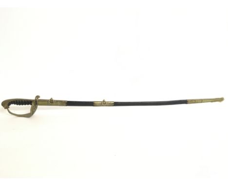 A Naval dress sword with an 80cm long blade, lion head pommel, crown and anchor plaque and a leather scabbard. By Hugo Baruch