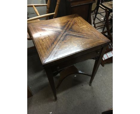 An Edwardian rosewood envelope card table with inlaid design dimensions 53x53x70cm.