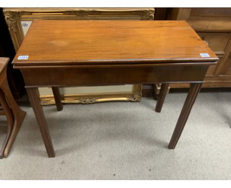 A Georgian Mahogany folding card table with square receded legs. 88.5cm x 42cm x 75cm.