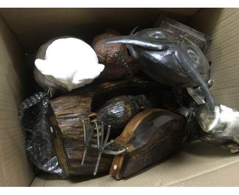 A collection of large owl figures including ceramic, wooden and other examples. This lot cannot be posted