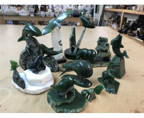 A collection of carved Jade sculptures- Limited edition including Playful Whales 2/150