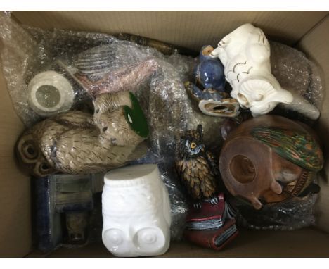 A large collection of assorted ceramic owl figures. This lot cannot be posted