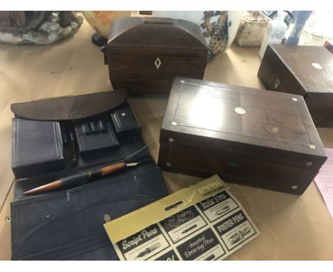 A Georgian mahogany tea caddy together with a sewing box and leather stationery case