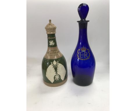 A Spode ceramic coronation decanter and a Queen Elizabeth silver jubilee decanter.