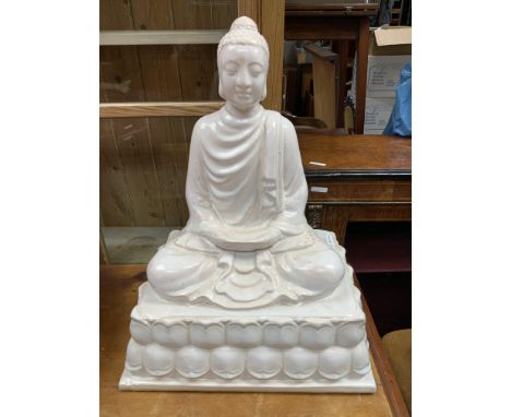 A large modern ceramic figure of Buddha. 54cm x 41cm x 32cm