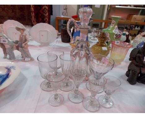 Glass decanter and stopper together with various antique stemmed glass.