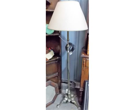 Art Nouveau silvered brass telescopic standard lamp, raised on a petal leaf tripod base