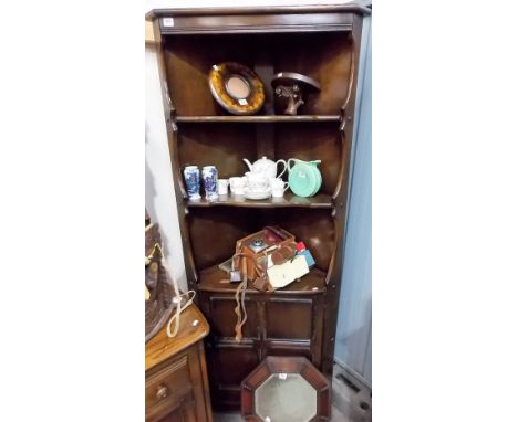 Ercol dark elm floor standing corner cupboard with two open shelves over a cupboard door