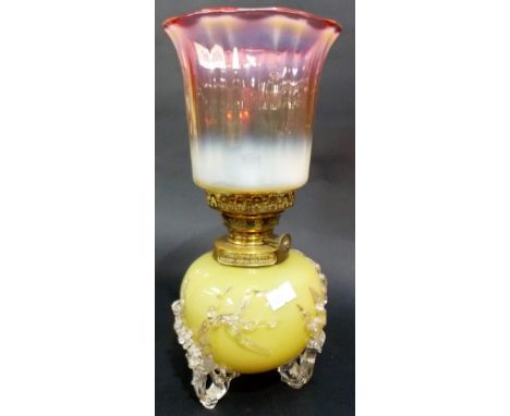 A Williams & Bach small glass oil lamp with pink blush opaline shade over a yellow opaque ovoid base raised on clear trailed 