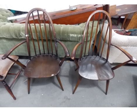 Pair of Ercol dark elm Quaker carver chairs