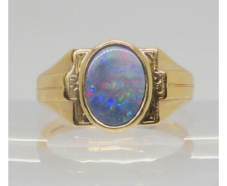 A 9ct gold opal doublet ring, size V, weight 5.8gms Condition Report:Available upon request