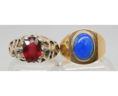 A 10k gold gents ring set with a blue opaque gem, size V1/2 weight 6.2gms, together with a retro silver ring set with a glass