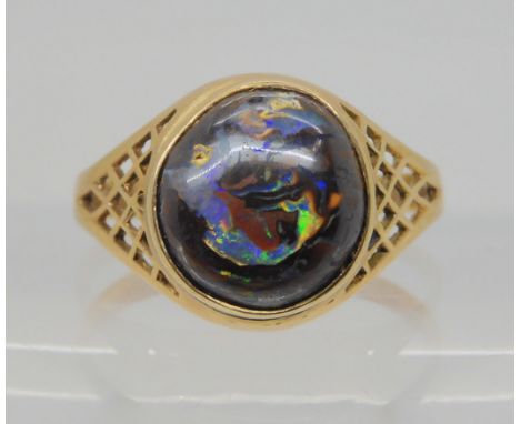 A 9ct gold opal matrix ring, size X1/2, weight 3.4gms Condition Report:Available upon request