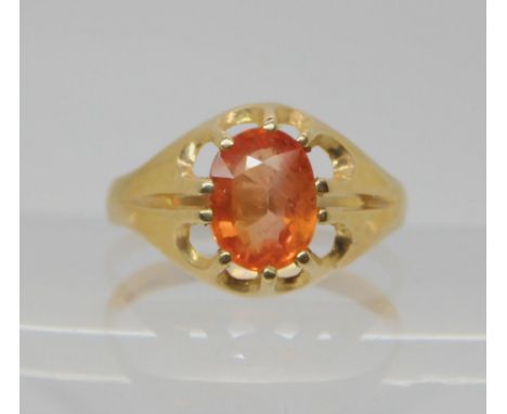A 9ct gold ring set with an orange gem, size R, weight 2.1gms Condition Report:Available upon request