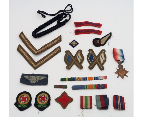 A 1914 Star, awarded to Pte P Kelly of 2/R Scots, together with a collection of medal ribbons; cloth patches and insignia, to