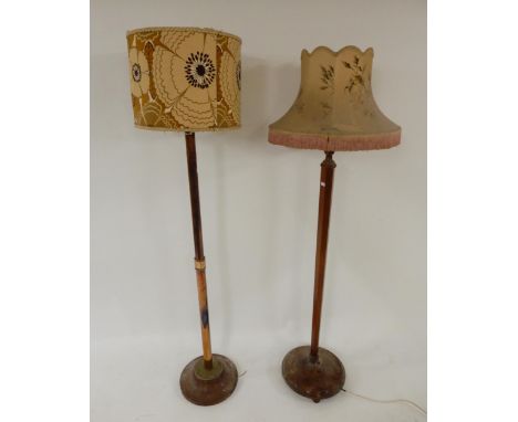 An early 20th century copper and brass standard lamp and a mahogany standard lamp (2) Condition Report:Available upon request