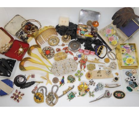 A collection of vintage costume jewellery, to include hair combs, a Bourjois compact, a Coty reps badge, a collection of natu