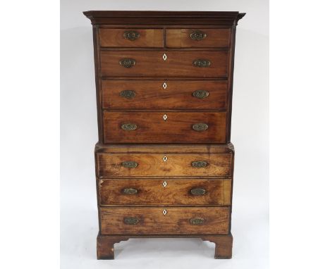 A GEORGE III MAHOGANY CHEST ON CHEST with corniced top above two short over three long drawers above three long drawer base o