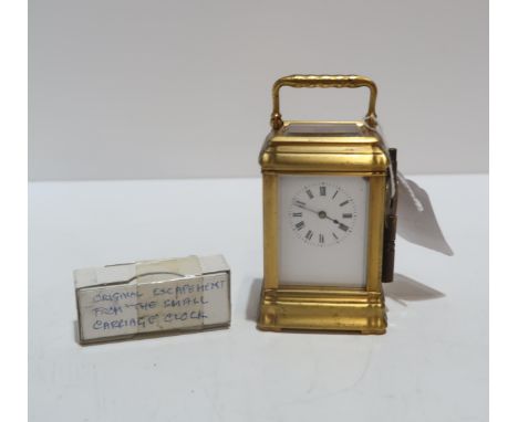 A miniature carriage clock, the movement stamped 8143 Condition Report:Available upon request