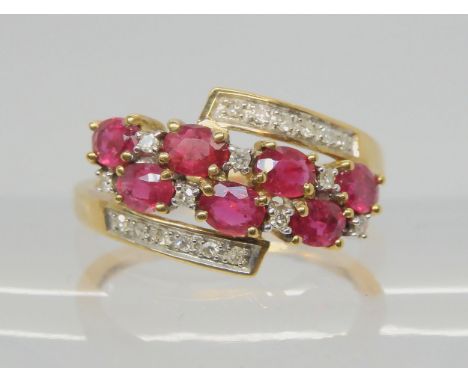 A 9ct gold QVC branded ruby and diamond ring, size P1/2, weight 2.7gms Condition Report:Available upon request