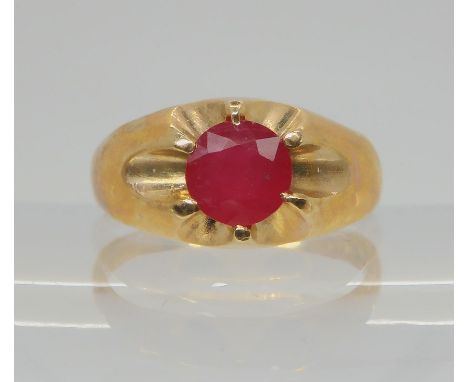 A 9ct gold gents Gypsy ring set with a treated ruby, size U, weight 4.5gms Condition Report:Available upon request