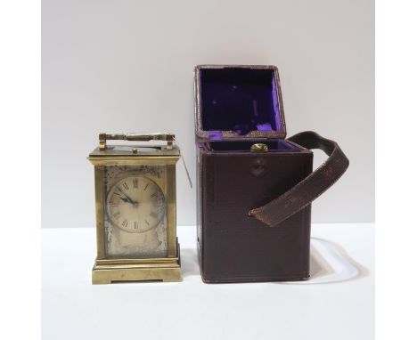 A French brass repeating carriage clock by E.M &amp; Co, with travel case Condition Report:Available upon request