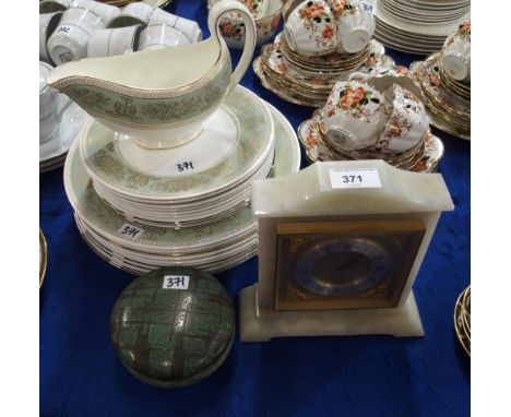 A WMF Ikora metal powder pot and cover, an Elsinor onyx clock, Wedgwood Gold Columbia pattern plates, sauce boat and other it