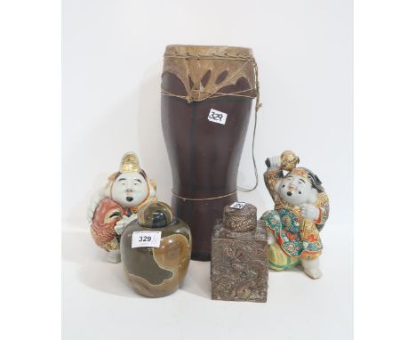 A pair of Satsuma figures, a drum, a tea caddy and a stone pot Condition Report:Available upon request