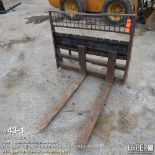 Fork attachment for skid loader