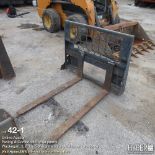 Fork attachment for skid loader