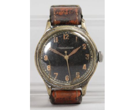 A JAEGER LECOULTRE ARMY WATCH with leather strap.