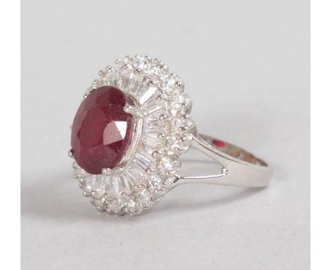 A LOVELY SILVER SET, "RUBY" AND BRILLIANT SET DRESS RING.