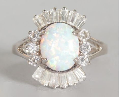 A GILSON OPAL AND BRILLIANT DRESS RING.