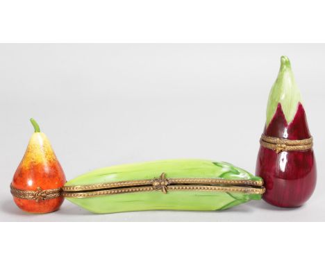 THREE LIMOGES ENAMEL FRUIT, banana, pear and aubergine.