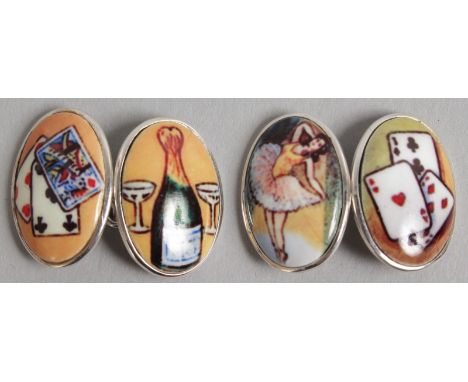 A PAIR OF SILVER AND ENAMEL "FOUR VICES" CUFFLINKS.