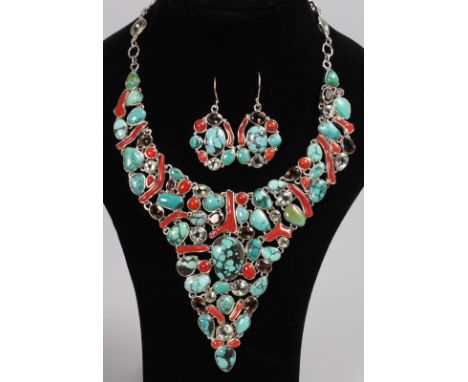 A CORAL AND FINE TURQUOISE GEM SET STERLING SILVER NECKLACE AND EARRINGS.