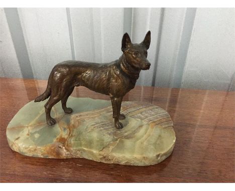 Bronze dog on marble base