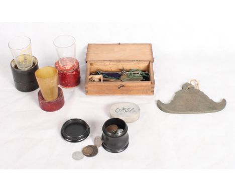 A set of jeweller's scales, in wooden box, a Tibetan gong, three beakers, a marble tablet, a circular ebonised floral carved 