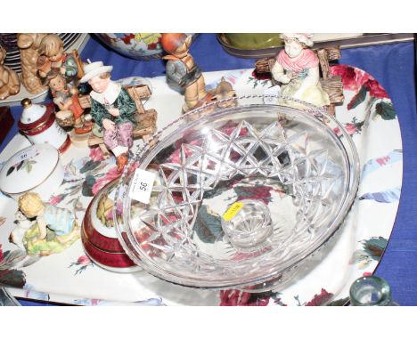 A Royal Worcester china figure, "Two Babies" by Doughty, three Hummel figures, a Stuart Crystal pedestal glass dish and other