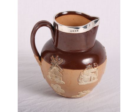 A Doulton Lambeth two-tone brown stoneware hunting jug with applied silver rim, 7" high