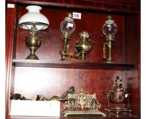 A number of mainly 19th Century horse brasses, letter scales, a copper spirit kettle and other items of brass ware